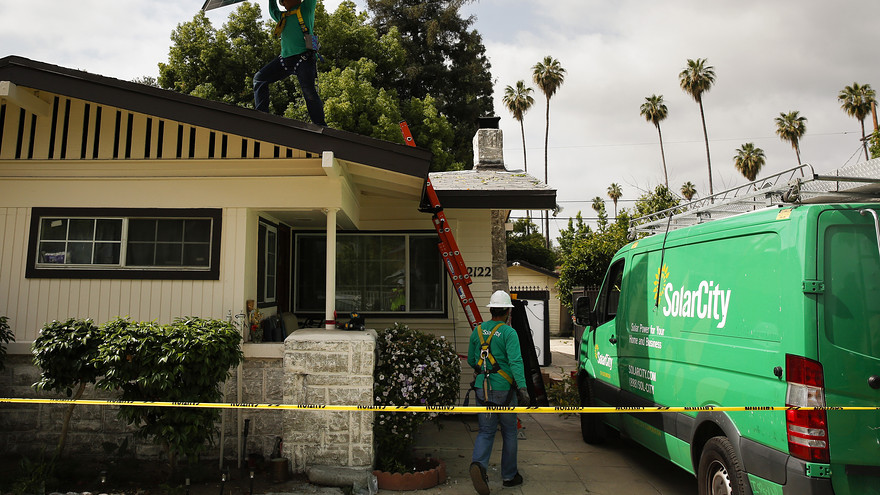 Solar City worker and van